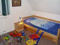 Ein Kinderzimmer befindet sich im Obergeschoss